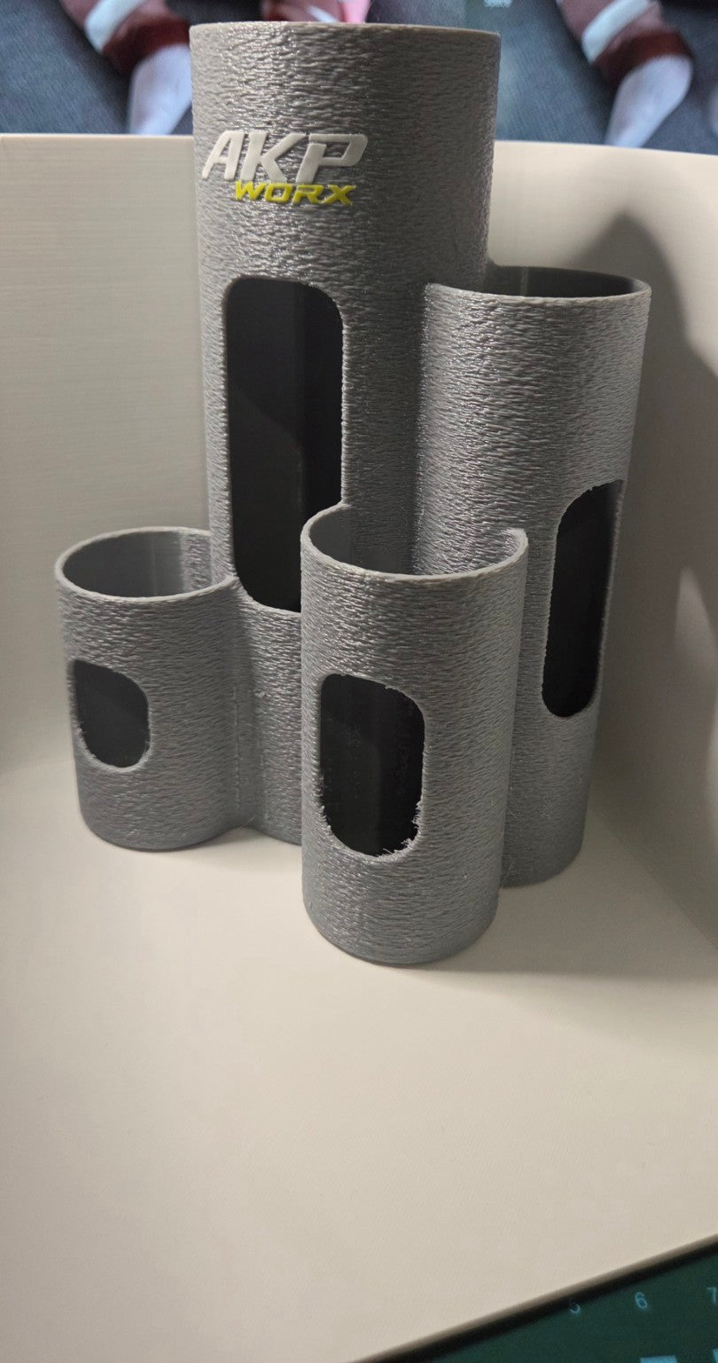 Angled view of four-compartment cable tie holder