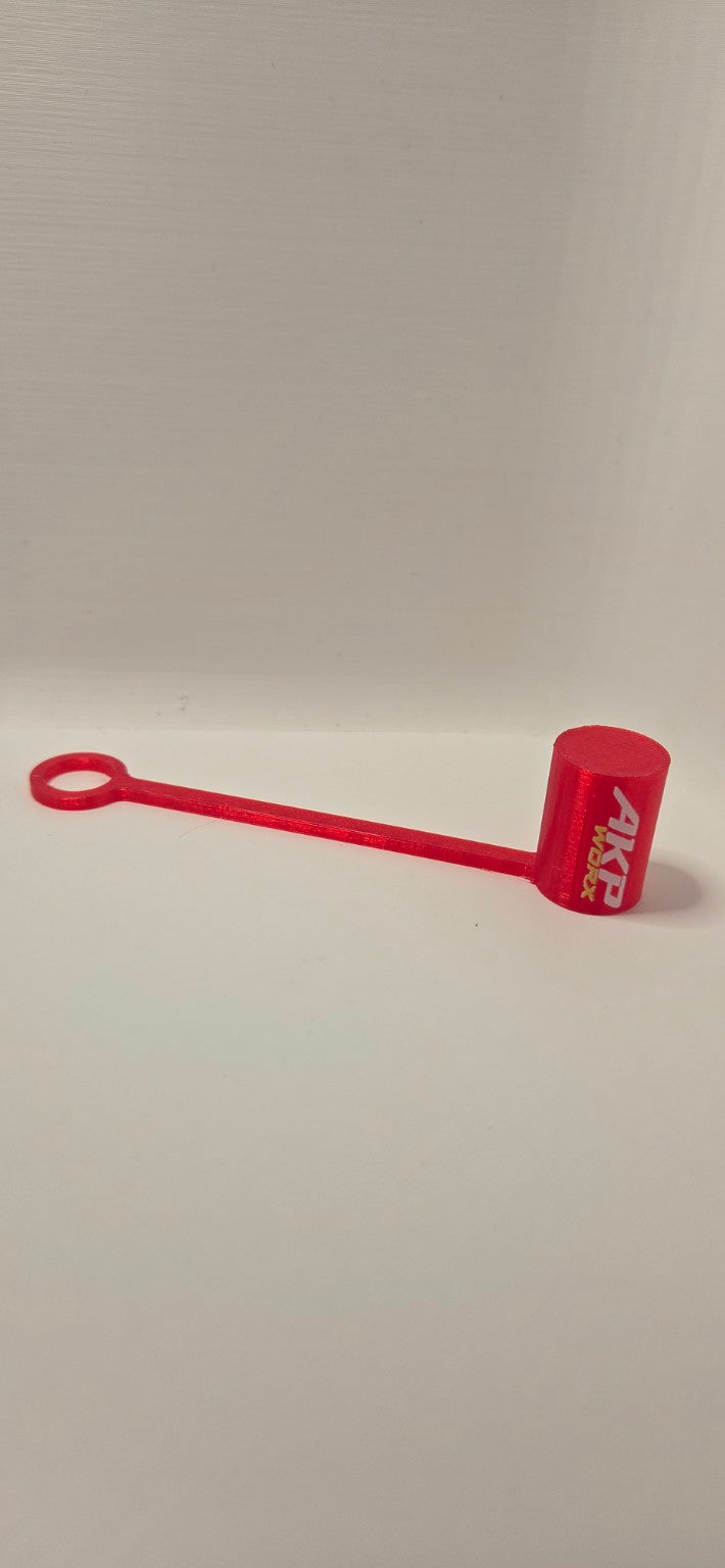 Red AKP WORX flexible TPU grease gun cap cover with tether