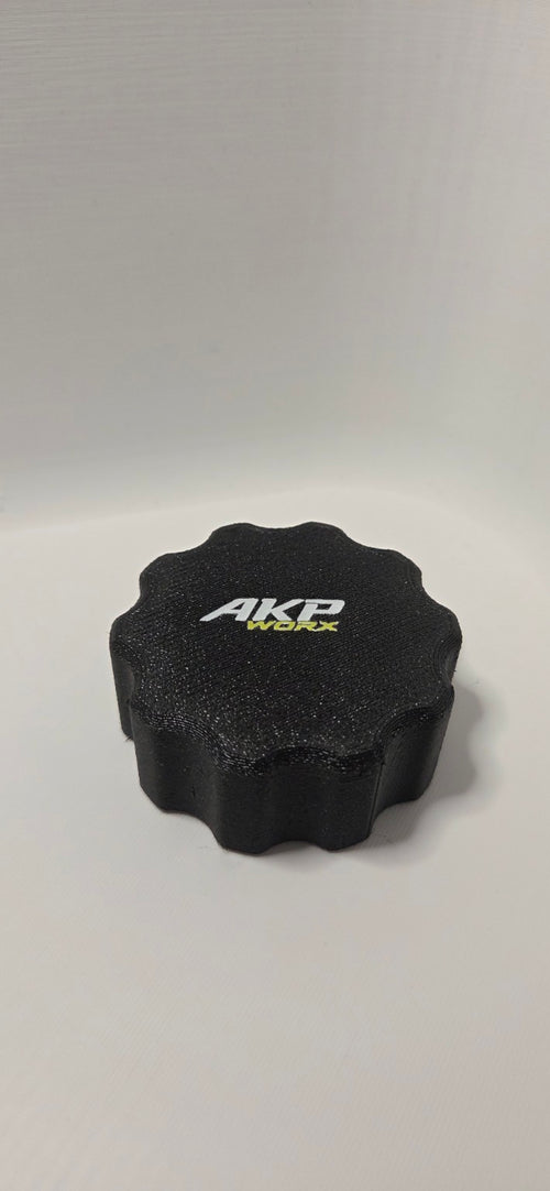Black AKP WORX 13-pin trailer cap branded top view